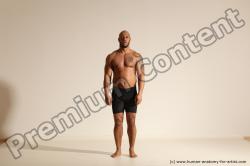 Underwear Gymnastic poses Man Black Muscular Bald Dancing Dynamic poses Academic